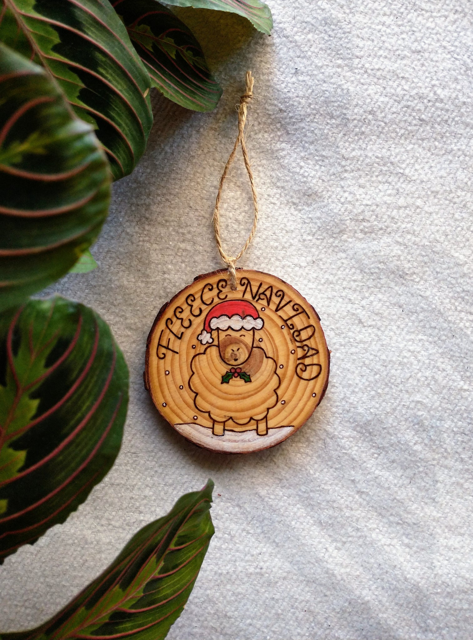 Fleece Navidad - Wood Slice Christmas Ornament